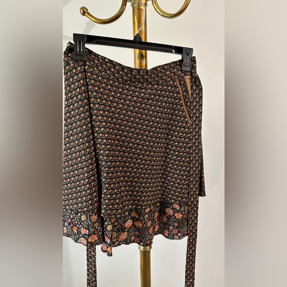 Short skirt. Very cute silk like material.
